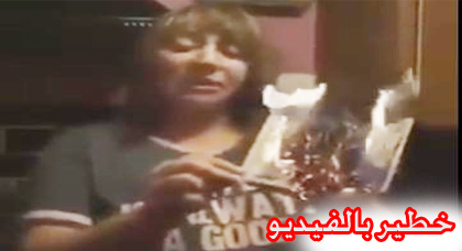 مواطنة مغربية تحرق جواز سفرها إحتجاجا على مقتل محسن فكري بالحسيمة 