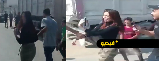 أسيرة إسرائيلية تبدو سعيدة أثناء اقتيادها إلى غزة أسيرة إسرائيلية تبدو سعيدة أثناء اقتيادها إلى غزة