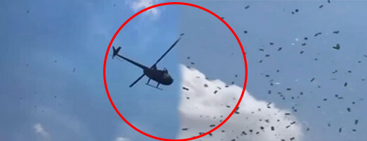 أبناء رجل أعمال قاموا بإسقاط آلاف الدولارات من مروحية تكريما لذكرى والدهم أبناء رجل أعمال قاموا بإسقاط آلاف الدولارات من مروحية تكريما لذكرى والدهم