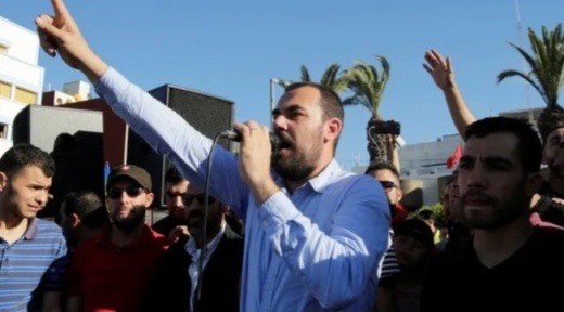 حملة دولية للإفراج عن الزفزافي.. البكاري ينوه بالتدخلات الخارجية ويفضل الحل الوطني لمعتقلي الحراك حملة دولية للإفراج عن الزفزافي.. البكاري ينوه بالتدخلات الخارجية ويفضل الحل الوطني لمعتقلي الحراك