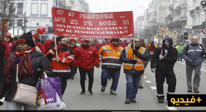 الآلاف من العمال المغاربة ببلجيكا يشاركون في مسيرة ضخمة رفضا لخطة الحكومة رفع سن التقاعد إلى 67 عاماً