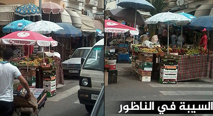 بائع جائل يضع عربته المجرورة وسط ممر الراجلين بالناظور في غياب تام للمسؤولين