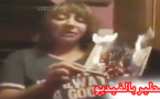 مواطنة مغربية تحرق جواز سفرها إحتجاجا على مقتل محسن فكري بالحسيمة 