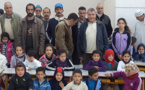 بالصور:جمعية إحدوثن بألمانيا توزع ملابس وأغطية على أطفال دوار احدوثن بأركمان