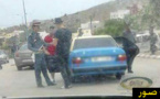 صور تظهر عناصر الأمن تفرض مراقبة شديدة  لحركة التنقل الى مدينة الحسيمة