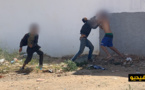 شاهدوا.. شجار عنيف بين "حراكة" وحارس سيارات وسط الناظور