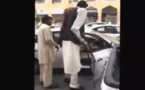 بالفيديو: كيف يركب أطول رجل في العالم التاكسي
