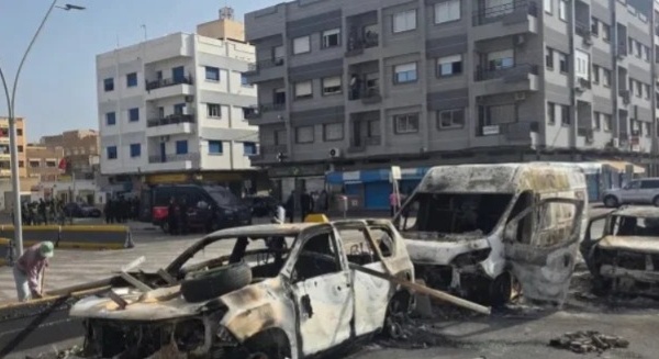 توقيف مشتبه فيه بإحراق سيارة عمومية خلال أحداث الشغب بمحيط معبر مليلية